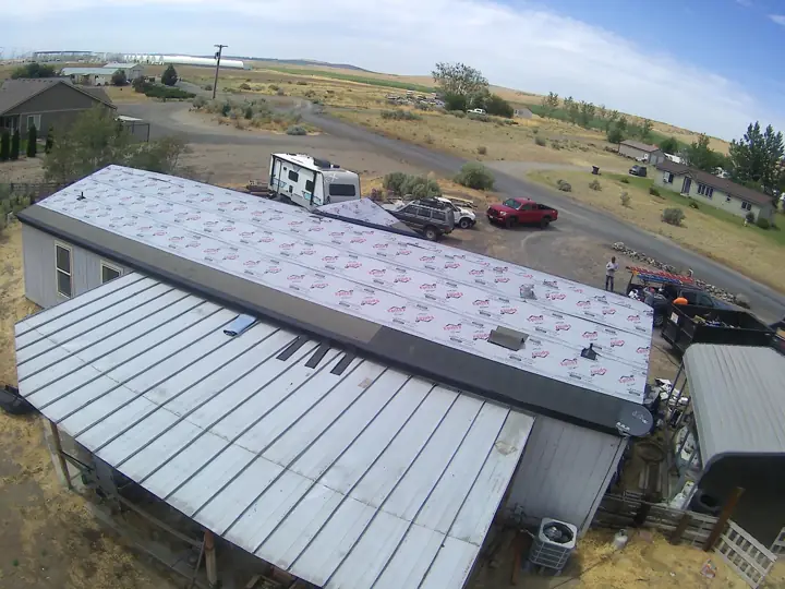 Synthetic underlayment installed on a manufactured home roof