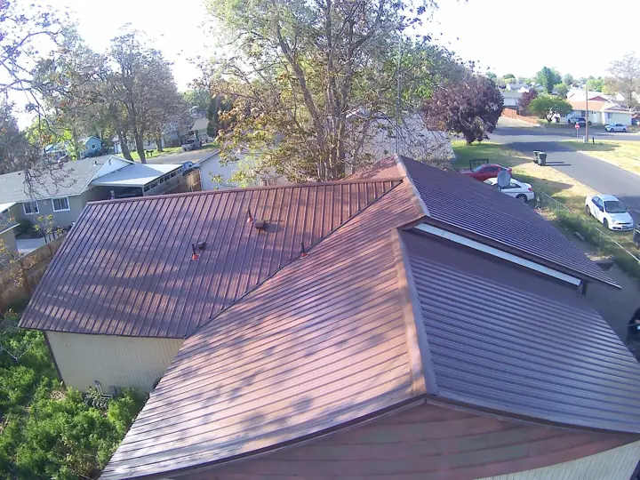 Multi-section metal roof