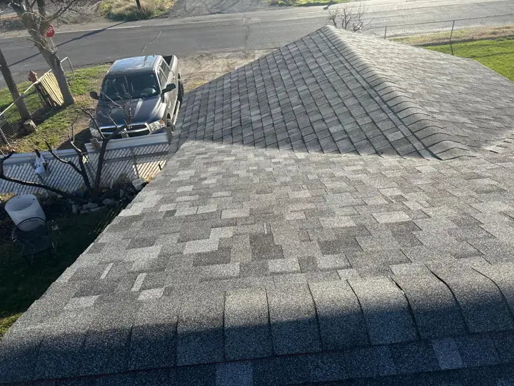 Corner-lot home with new shingle roof